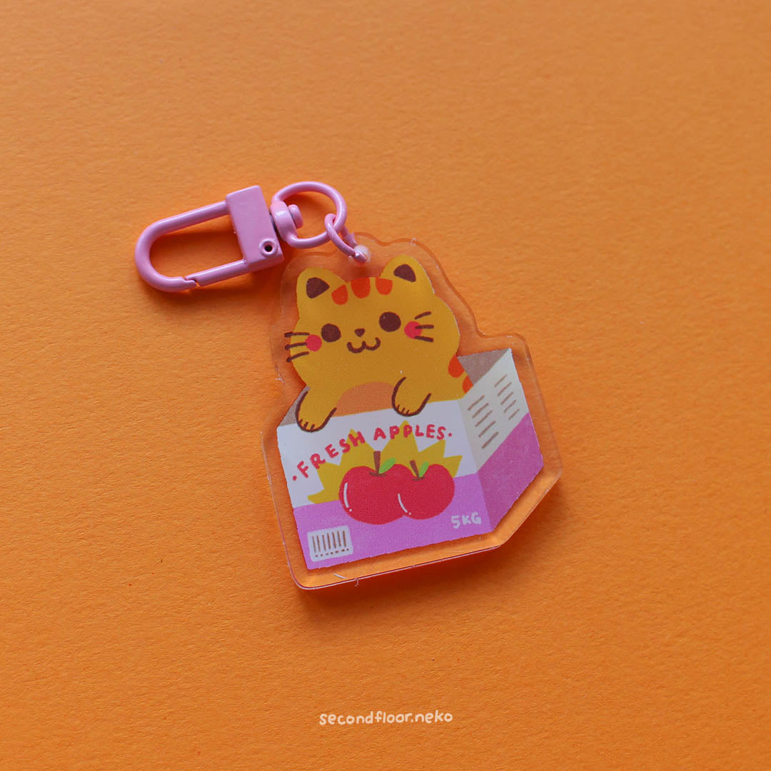 Cats in boxes keychain